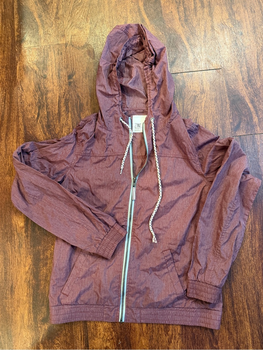 Zine Clothing Hooded Raincoat in Maroon